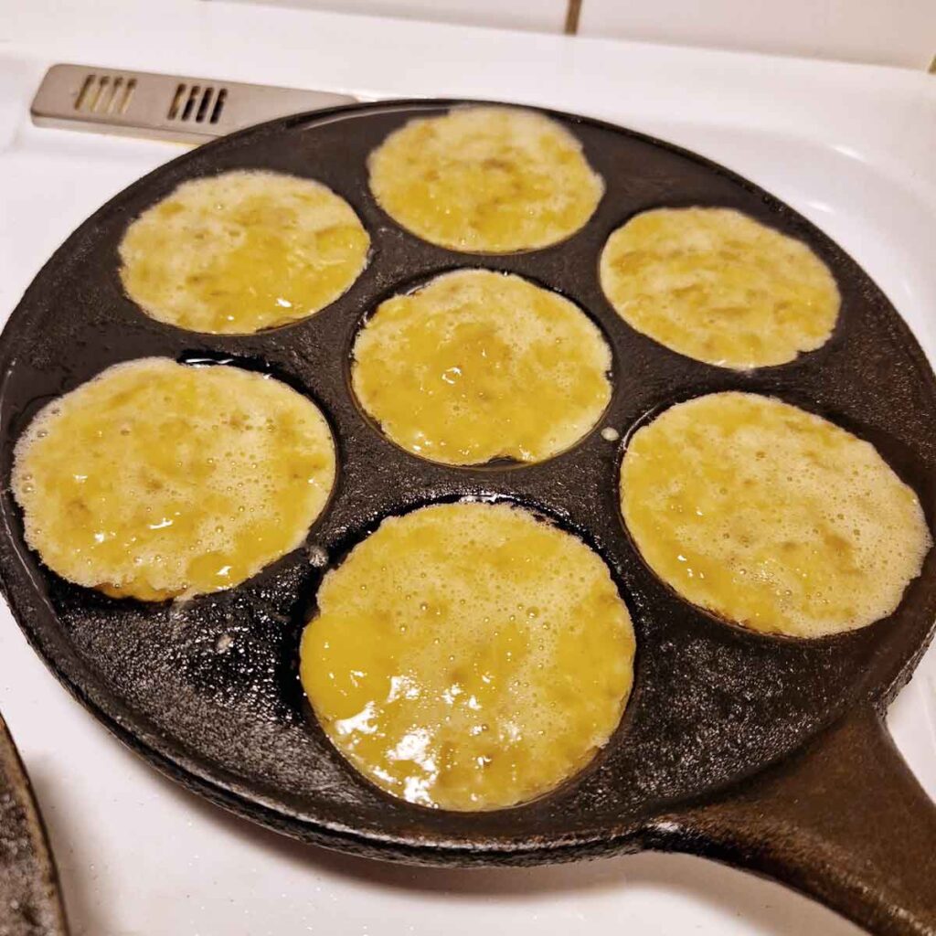 The banana pancakes on the stove